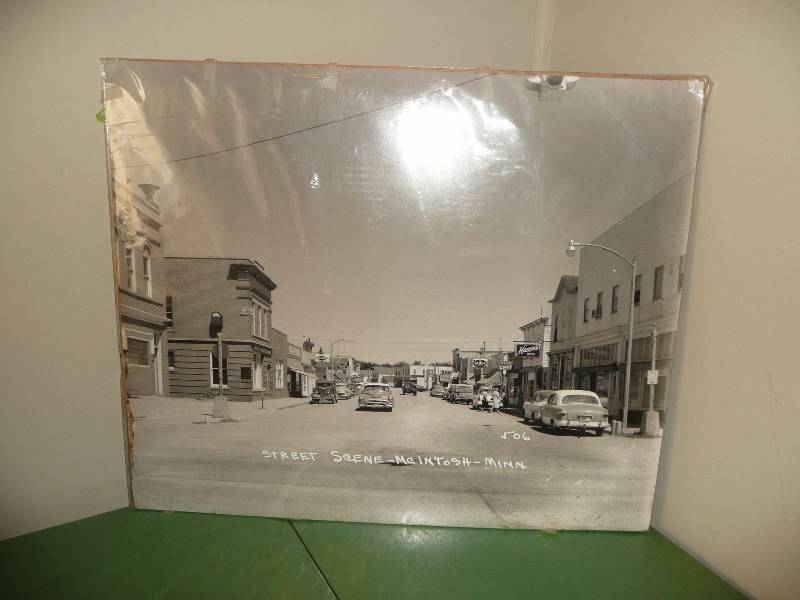 lot 30 image: ANTIQUE LARGE POSTER PHOTO OF MCINTOSH, MN STREET SCENE - APPROX 2FT WIDE BY 21IN HIGH