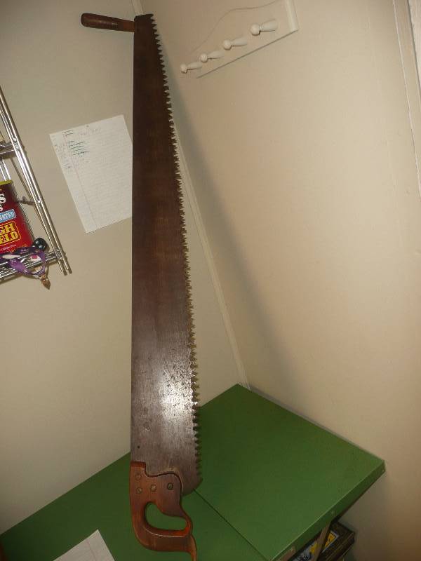 lot 31 image: Vintage Two Man Crosscut Logging Saw Double wood handle rustic wall art cabin decor - APPROX 5FT LONG