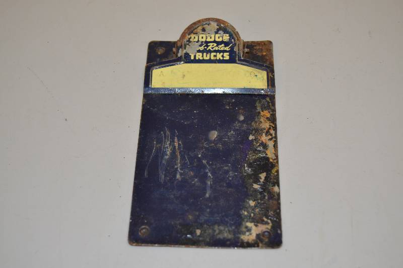 lot 24 image: Vintage dodge clipboard