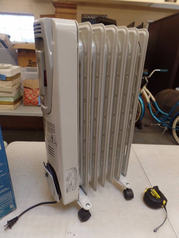lot 593 image: DeLonghi Heater