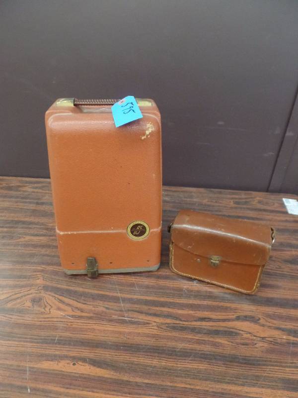 lot 595 image: Vintage Movie Projector and Movie Camera