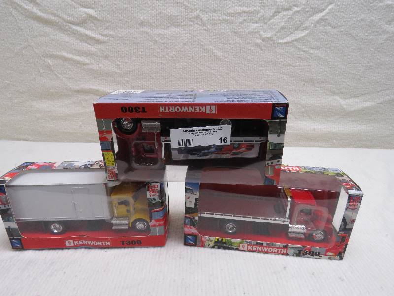 lot 16 image: Kenworth Semi Trucks