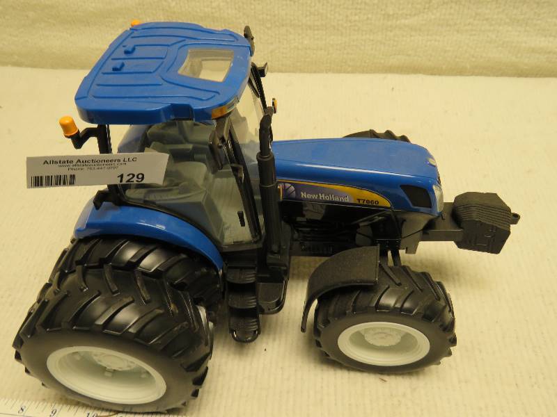 lot 129 image: Collectible New Holland Tractor
