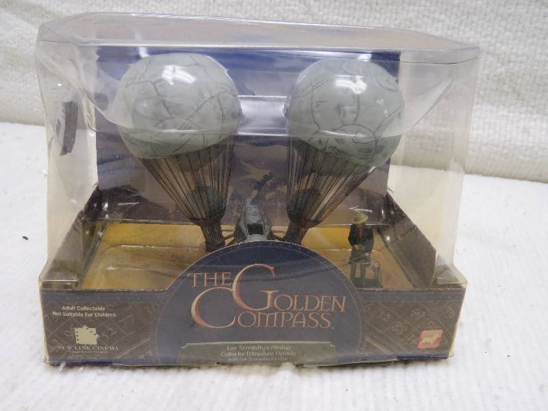 lot 148 image: The Golden Compass