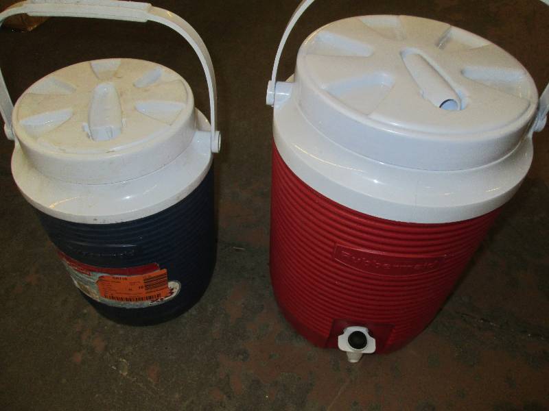 lot 27 image: 2 water jugs blue one is 1 gallon m...