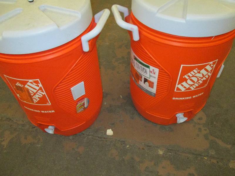 lot 62 image: 2 rubbermaid 5 gal. water jugs 1 ha...