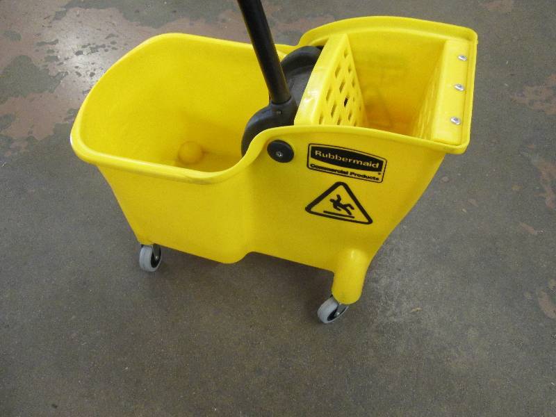 lot 70 image: 1 rubbermaid mop bucket all there a...