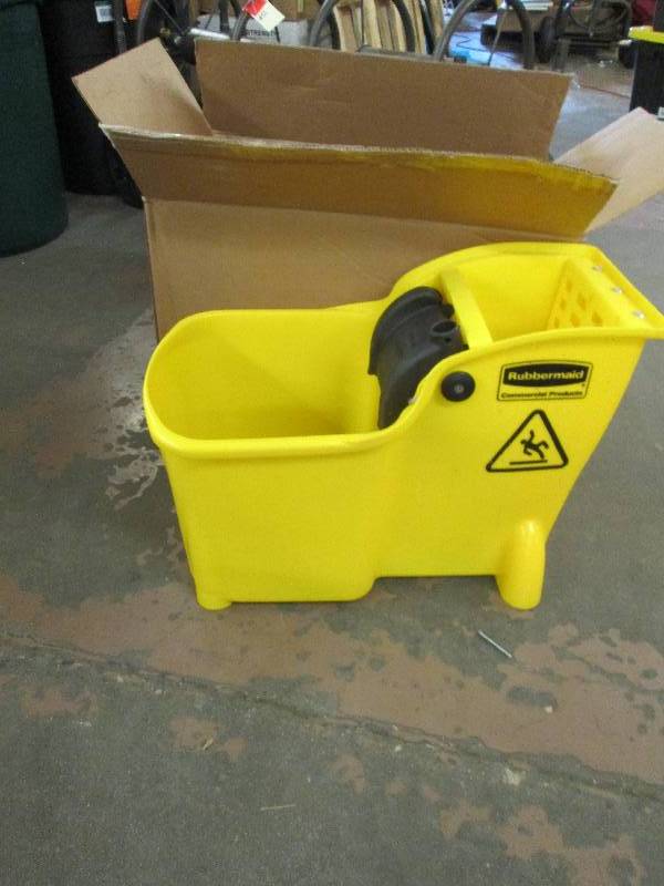 lot 73 image: 1 rubbermaid mop bucket all there a...