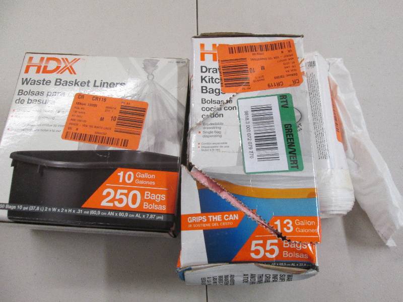 lot 111 image: 2 boxes of garbage bags and 1 open ...