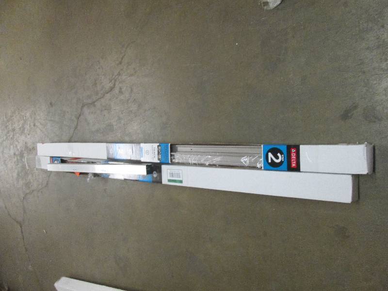 lot 141 image: 2 packages of 36 in. Pivoting Showe...