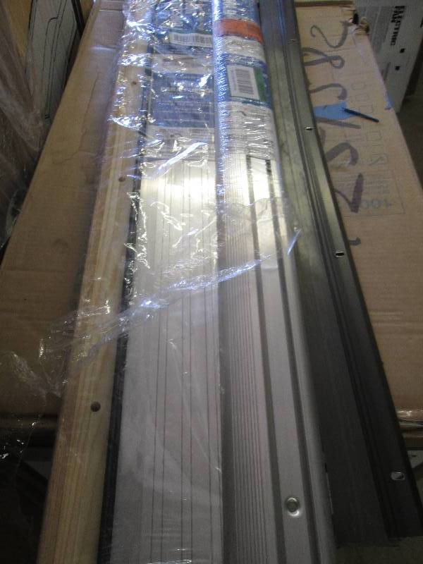 lot 268 image: 2 door thresholds and a door draft ...