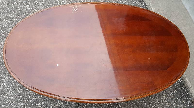 Brown oval coffee table