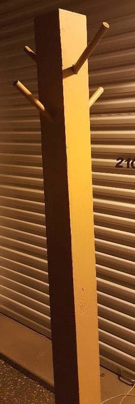 Tan wood homemade coat rack