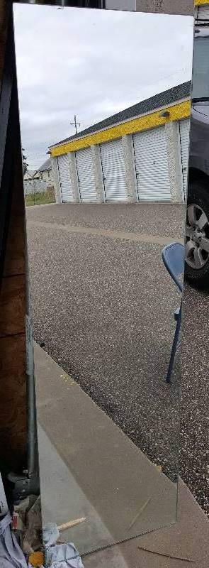 Five large unframed Mirrors