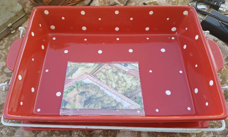 Red polka dot casserole dish with plate, and rack