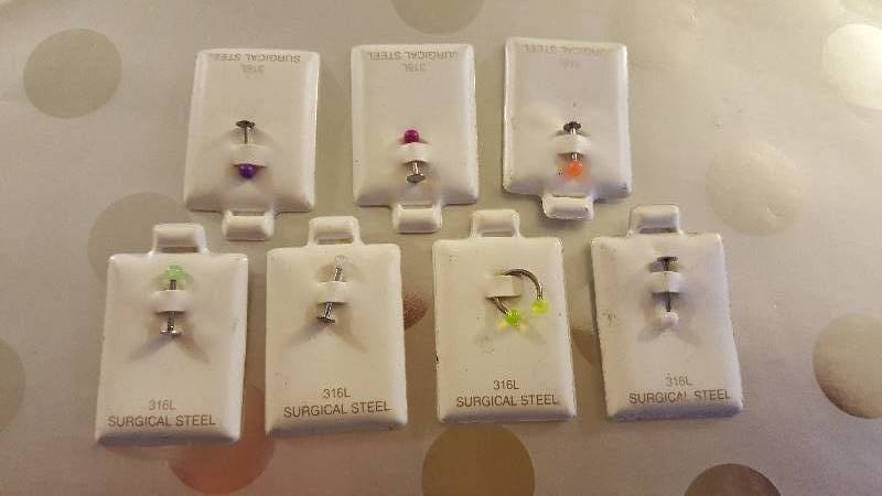 Lot of seven nose piercings -7