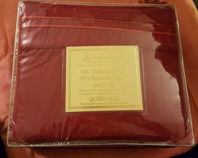 Unused red queen size sheets