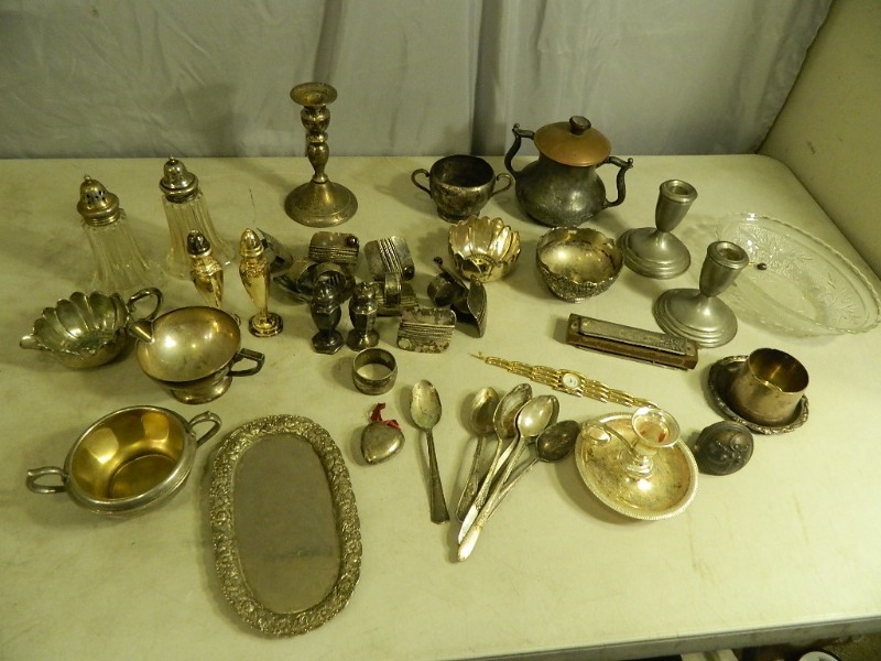 lot 49 image: Collectible Metalwares, Salt and Pepper, Napkin Rings, Harmonica, and More