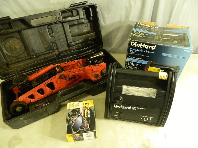 lot 67 image: Jumper Pack, Car Jack, Brake Pads
