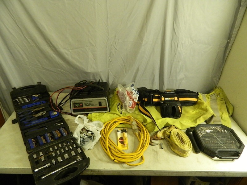 lot 87 image: Set of Tools, Tow Strap, Cord, Battery Charger, and More