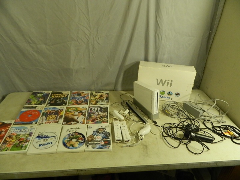 lot 91 image: Nintendo Wii System with 13 Games