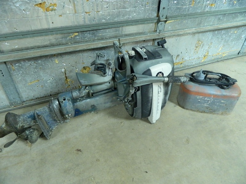 lot 12 image: Evinrude Outboard Boat Motor and Tank