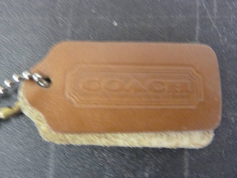 lot 112 image: Coach Coin Purse