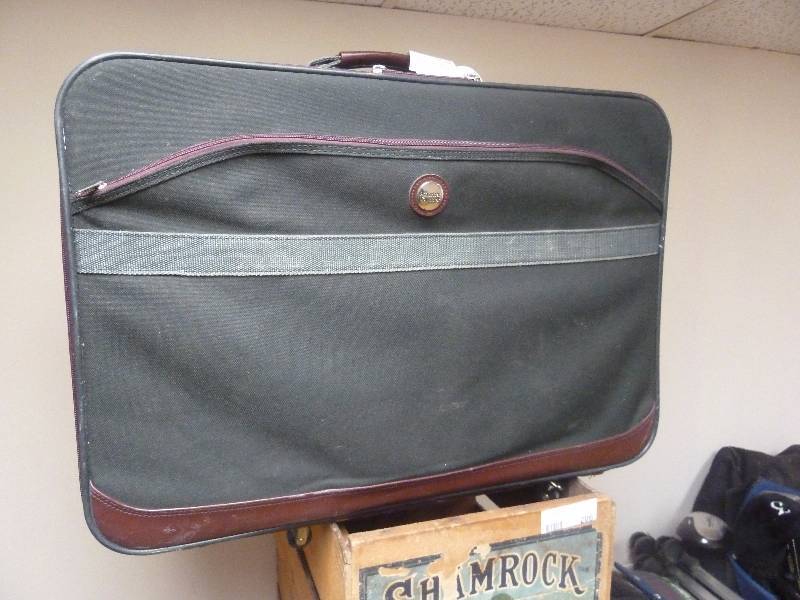 lot 205 image: American Tourister Suitcase