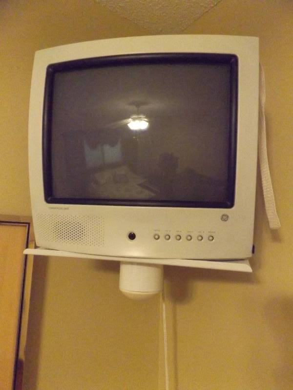 lot 380 image: Television with wall stand