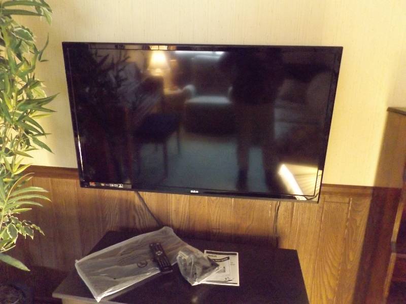 lot 392 image: RCA Flat Screen TV