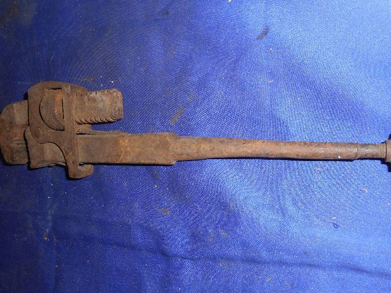 lot 26 image: ANTIQUE PIPE WRENCH