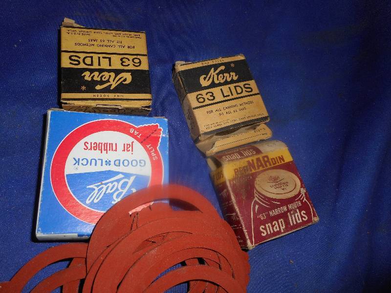 lot 52 image: VINTAGE RINGS AND LIDS