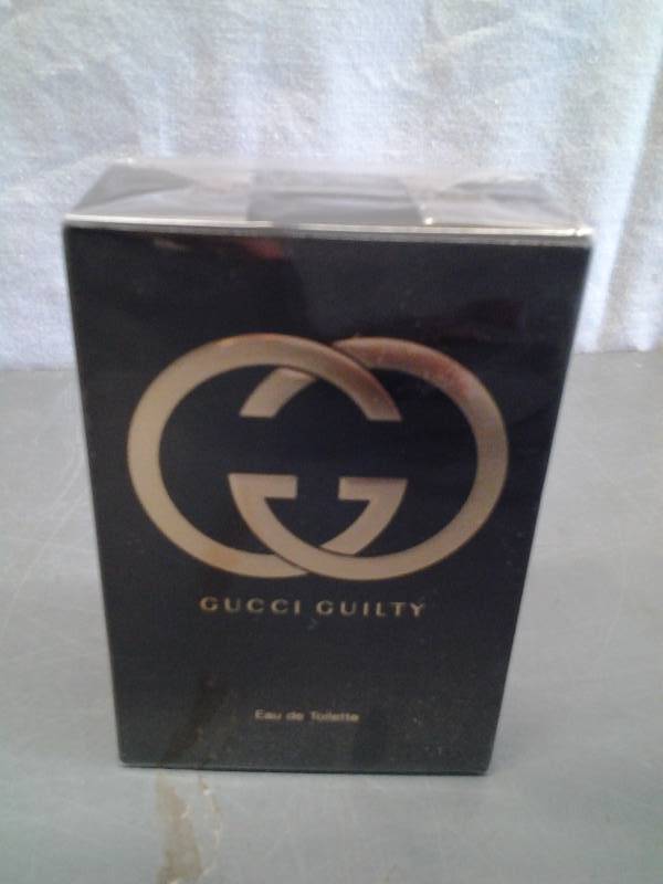 lot 9 image: Gucci Guilty Eau de Toilette 2.5 Oz. Unopened ($99.00)