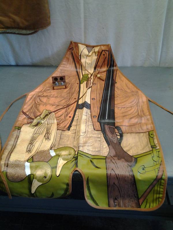lot 46 image: Vinyl Hunters Apron & Pair Of Biting Bullets