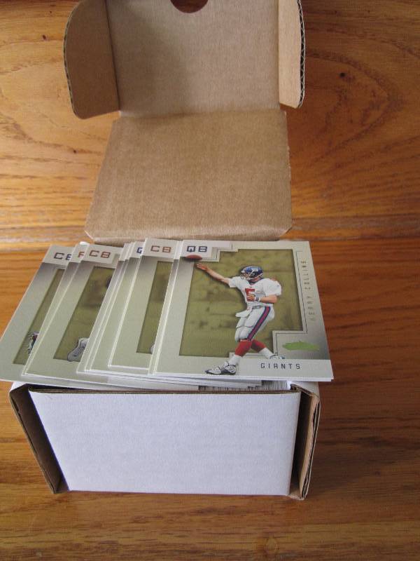 Box of 2001 fleer showcase football...