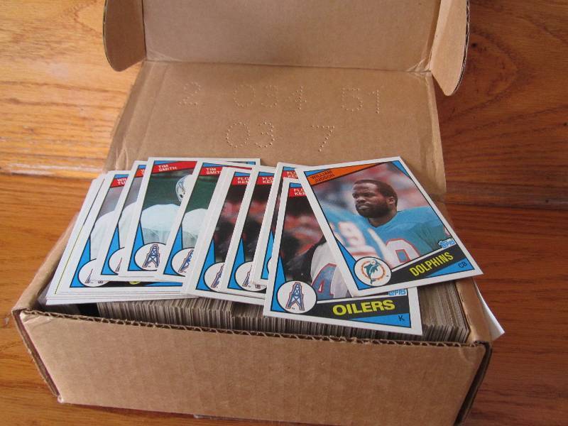 Box of 1984 topps football cards...