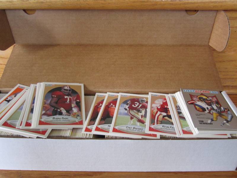 Box of 1990 fleer football cards...