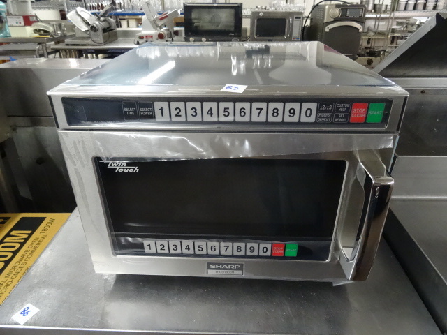 lot 85 image: Brand New Sharp  Microwave