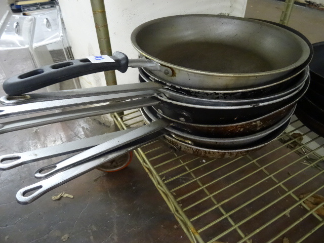 lot 203 image: 12 Sautee Pans