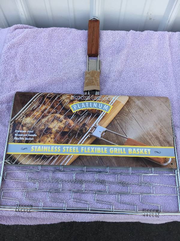 lot 21 image: Grill Basket, Canisters and Candle Holders