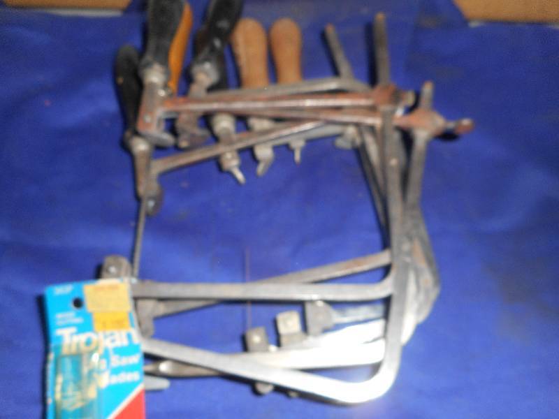 lot 48 image: 7 HAND SAWS AND BLADES
