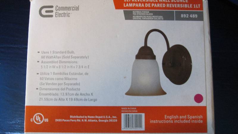 Reversible wall sconce