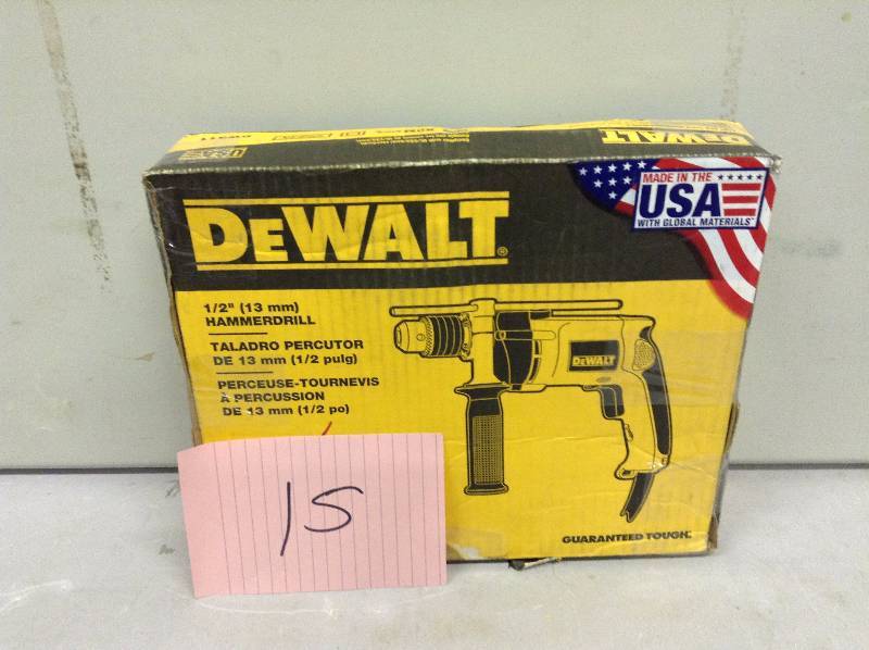 lot 15 image: Dewalt 12 in. Variable Speed Reversible Hammer Drill Never used actual and stock photos used