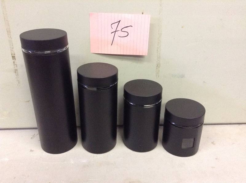 lot 75 image: Pure Life by Ragalta 4 Pc Glass Canister Set Black never used