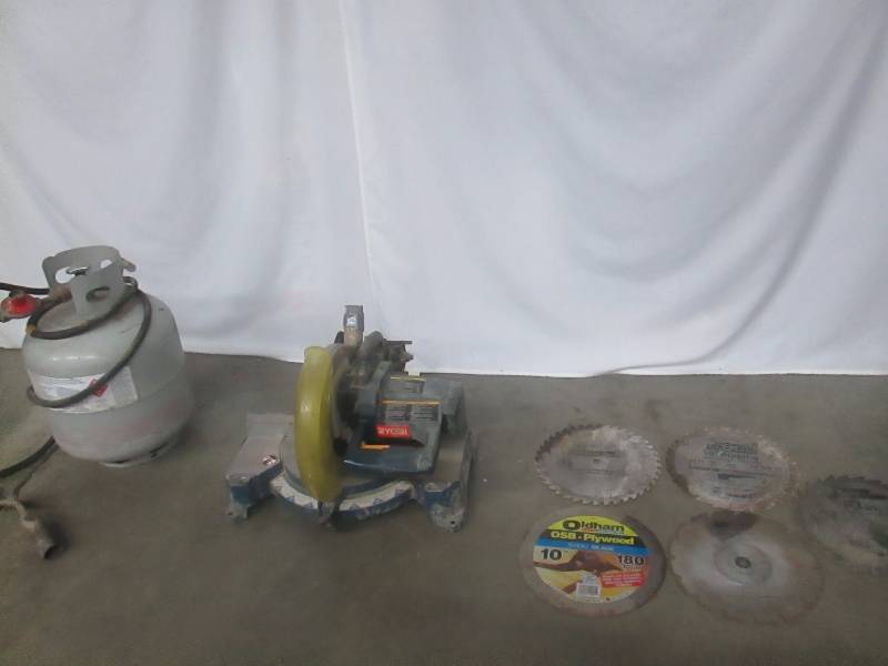 lot 34 image: Ryobi 10 Compound Miter Saw and Propane Tank with Torch Kit