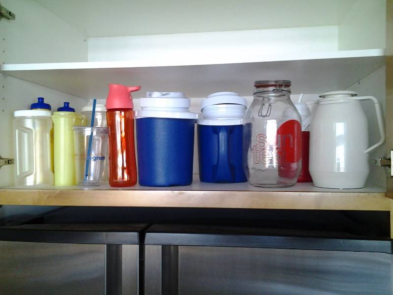 lot 73 image: Cabinet Full Of Beverage Jugs, Sun Tea Jar, Tumblers, Pitchers, More