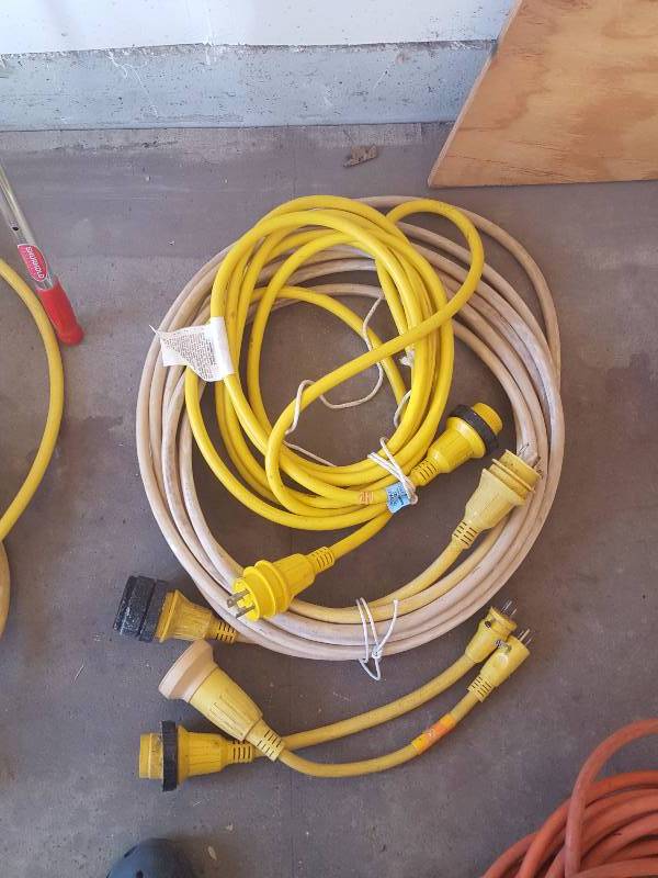 lot 196 image: 1-50 Ft, 1-25 Ft 30 Amp Dock Extension Cords