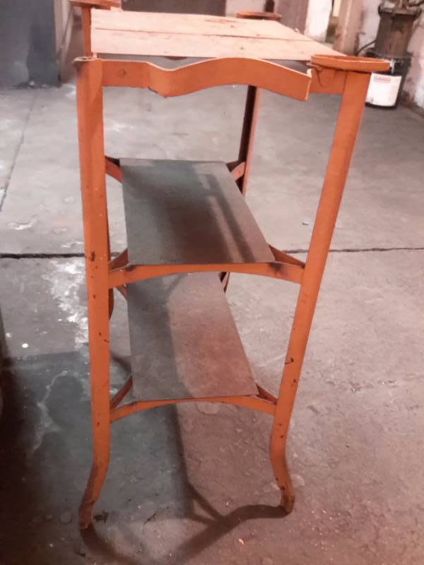Steel, Table.. Made of of old table not sure what it was from.  They welded a steel top on