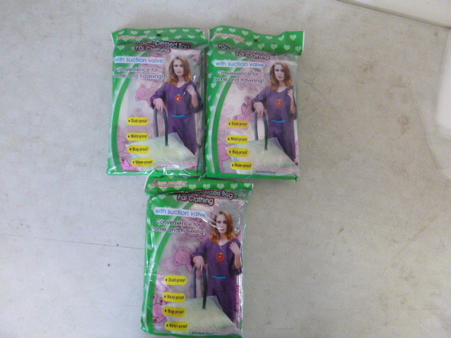 lot 99 image: 3 Vacuum Compressed Bags