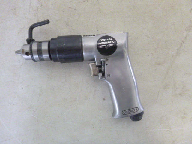 lot 455 image: Central Pneumatic 38 Reversible Air Drill